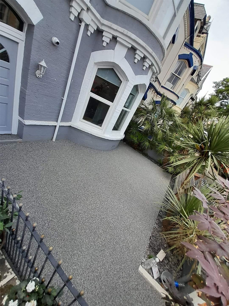 Grey resin bonded front garden